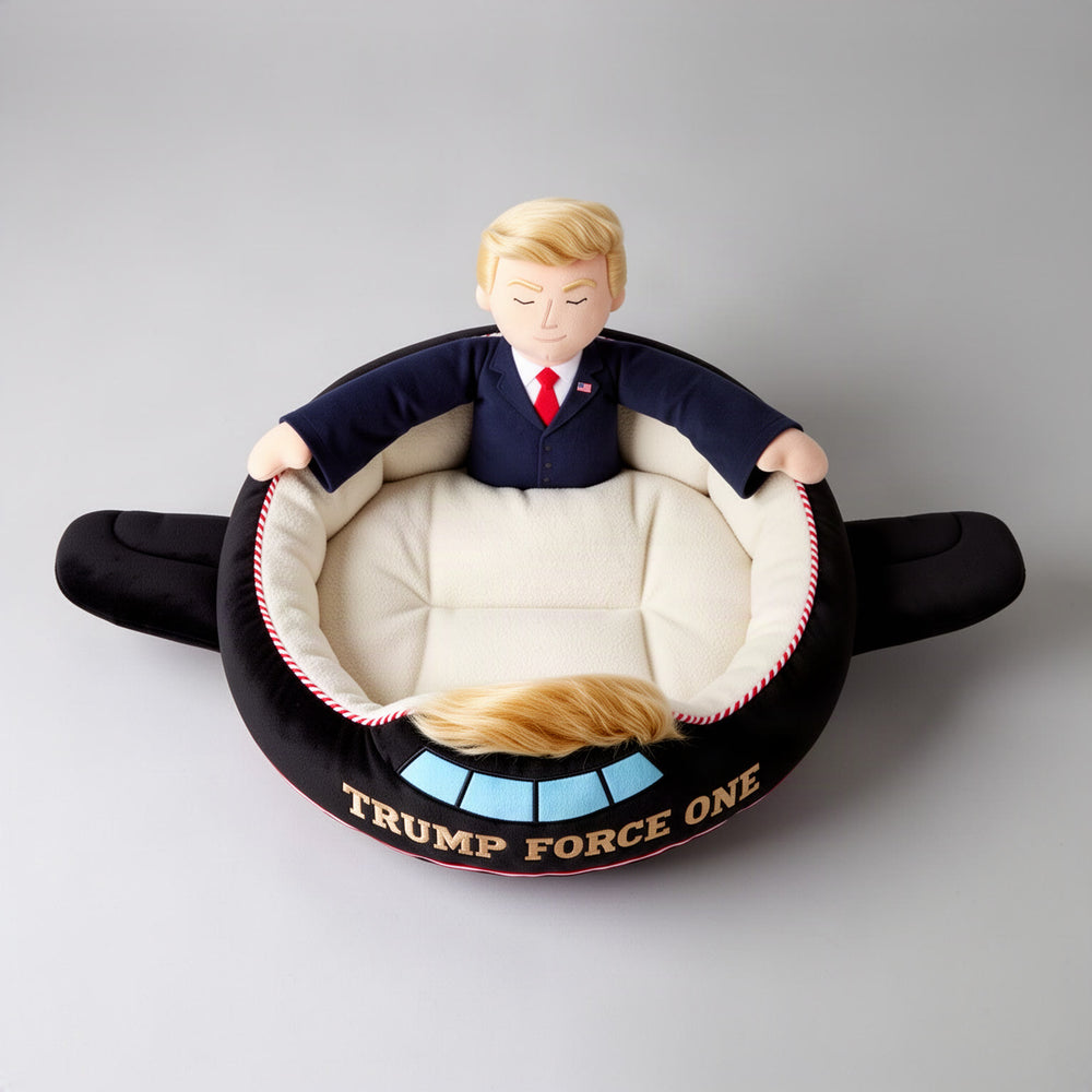 Lifestyle hero: a small dog curled up on the cream cushion of the black airplane bed in a bright living room, resting against the plush figure's arms