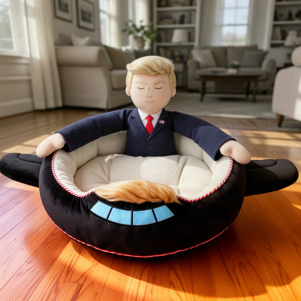 Close-up of the plush figure's arms resting over the rim on both sides, showing the stitched attachment