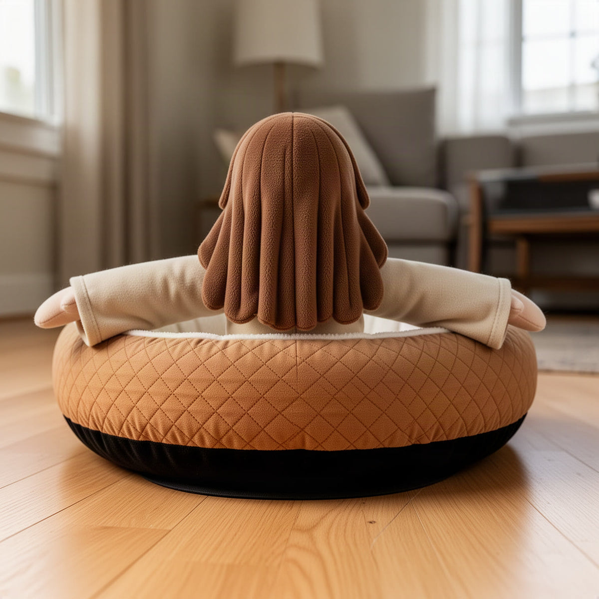 Bottom edge of the bed with its dark base on a floor, the figure firmly attached at the back