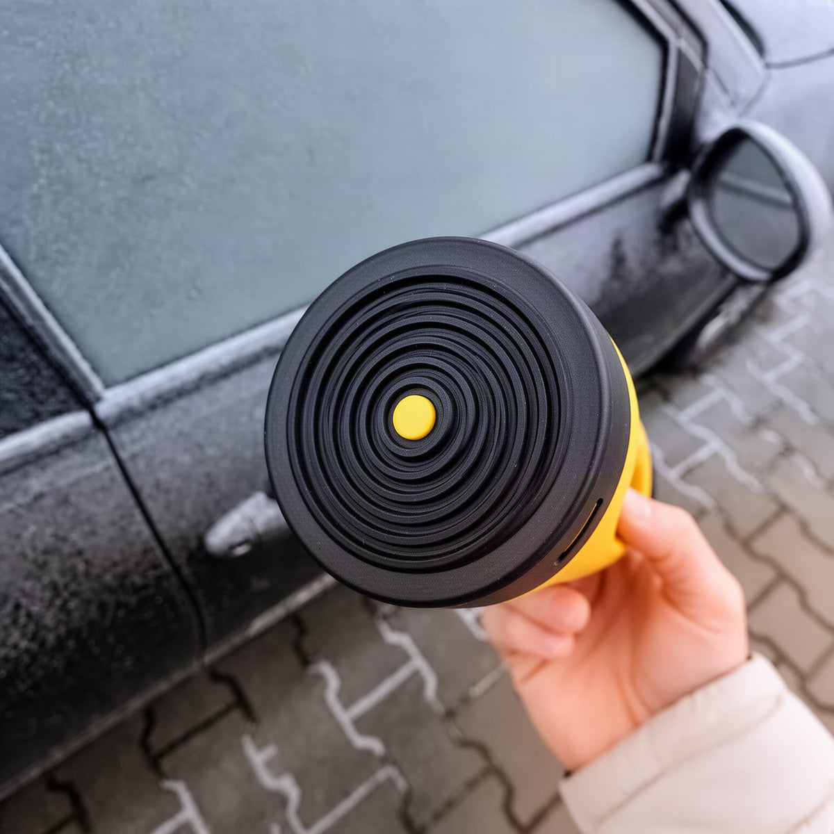 Macro of the black ridged working face with the small yellow centre piece