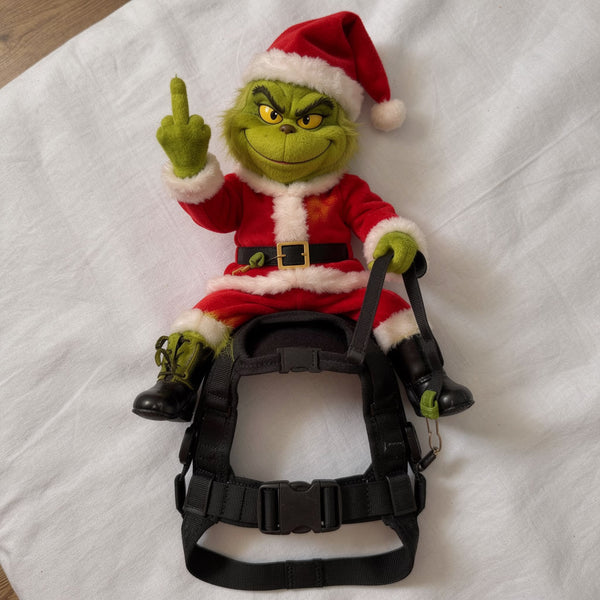 Product laid flat showing the figure already attached to the harness